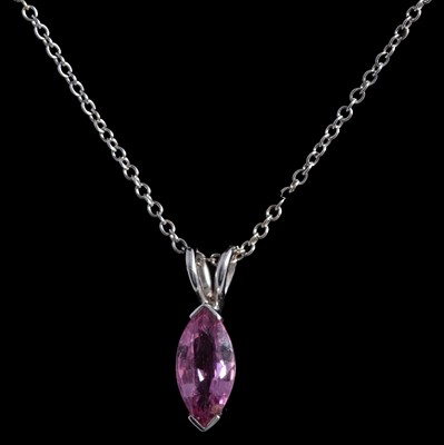 Lot 327 - A pink sapphire pendant on a chain.