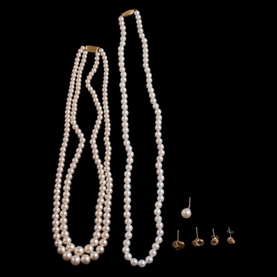 Lot 273 - A cultured pearl necklace, a simulated pearl necklace, and earrings.