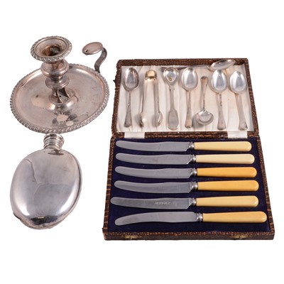 Lot 281 - A silver hip flask, Old Sheffield plate chamber stick, plated spoons and set of knives.