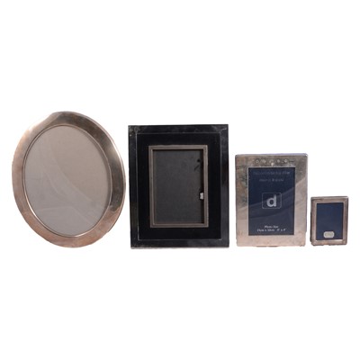Lot 271 - Three silver photograph frames and one silver-plated.