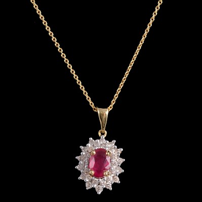 Lot 372 - A ruby and diamond pendant on a chain, and a pair of ruby and diamond earrings.