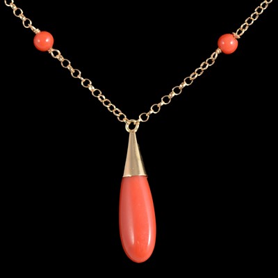 Lot 384 - A coral necklace with a pendant drop.