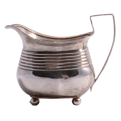 Lot 251 - Georgian silver milk jug