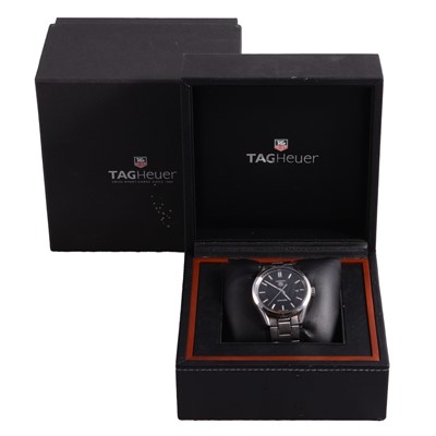 Lot 1053 - TAG Heuer - a gentleman's Carrera Calibre 5 stainless steel automatic bracelet wristwatch.