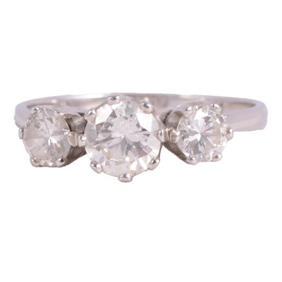 Lot 85 - A diamond three stone ring.