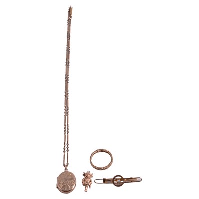 Lot 1207 - A gemset full eternity ring, yellow metal bar brooch, charm, and locket on a chain.