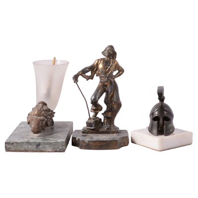 Lot 73 - Spelter figure of a Pirate, a small sculpture of a Grecian helmet, and a Cornucopia vase