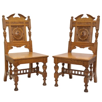 Lot 335 - Pair of Victorian oak hall chairs
