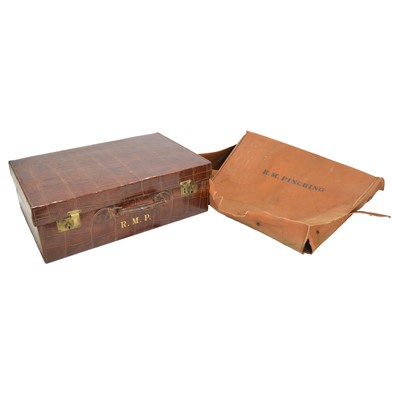 Lot 281 - Crocodile skin case, containing silver mounted accoutrements and another crocodile case