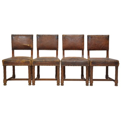Lot 308 - Four Victorian carved oak and leather dining chairs