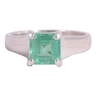 Lot 8 - An emerald solitaire ring.