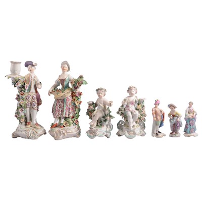 Lot 15 - Two pairs of continental figural groups and three smaller figures.
