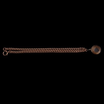 Lot 490 - A 9 carat rose gold double Albert watch chain and fob.