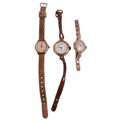 Lot 1106 - Two 9 carat yellow gold cased ladies' wristwatches, and one other.
