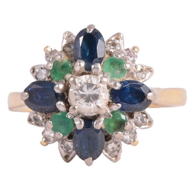 Lot 49 - An emerald, sapphire and diamond ring.