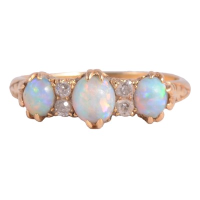 Lot 39 - An opal and diamond ring.