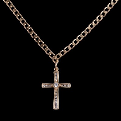 Lot 315 - A gemset cross pendant on a 9 carat yellow gold chain.