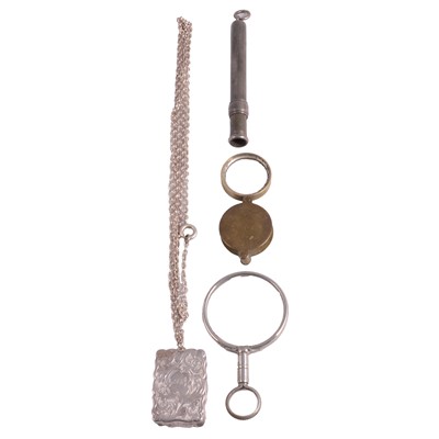 Lot 1223 - A Victorian silver vinaigrette on a chain, a propelling pencil case, and two magnifying glasses.