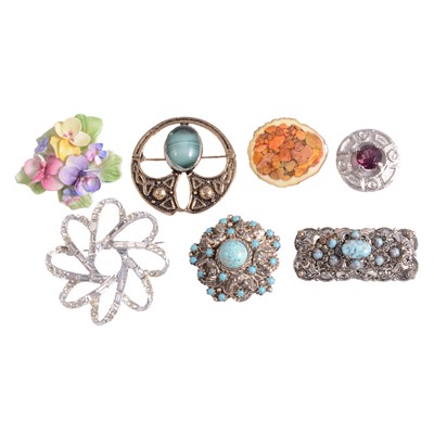 Lot 1291 - A collection of costume jewellery brooches, badges, cufflinks, and wristwatches.