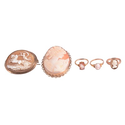 Lot 231 - Two carved shell cameo brooches, two carved shell cameo rings, and another similar ring.