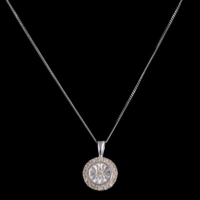 Lot 394 - A circular diamond pendant.