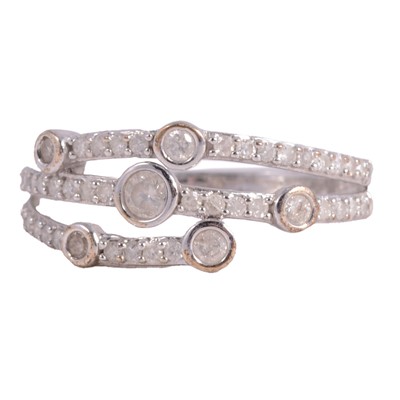 Lot 92 - A diamond crossover bubble style ring with six principal stones.