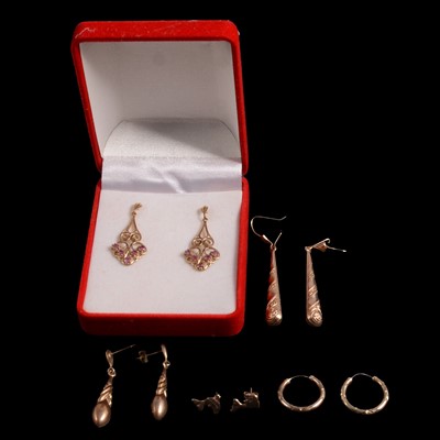 Lot 453 - Five pairs of yellow metal earrings for pierced ears.