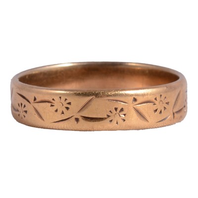 Lot 179 - A 22 carat gold wedding band.