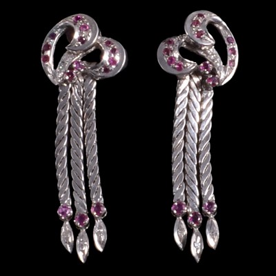 Lot 433 - A pair of ruby and diamond drop earrings.