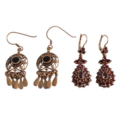 Lot 499 - A pair of garnet drop earrings, and another pair of metal earrings.