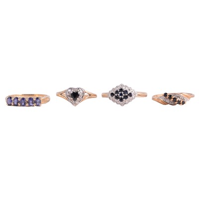 Lot 59 - Four gemset rings, sapphire and diamond, and another.