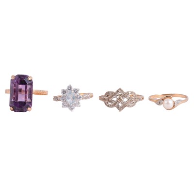 Lot 118 - An amethyst dress ring, and three other gemset rings.