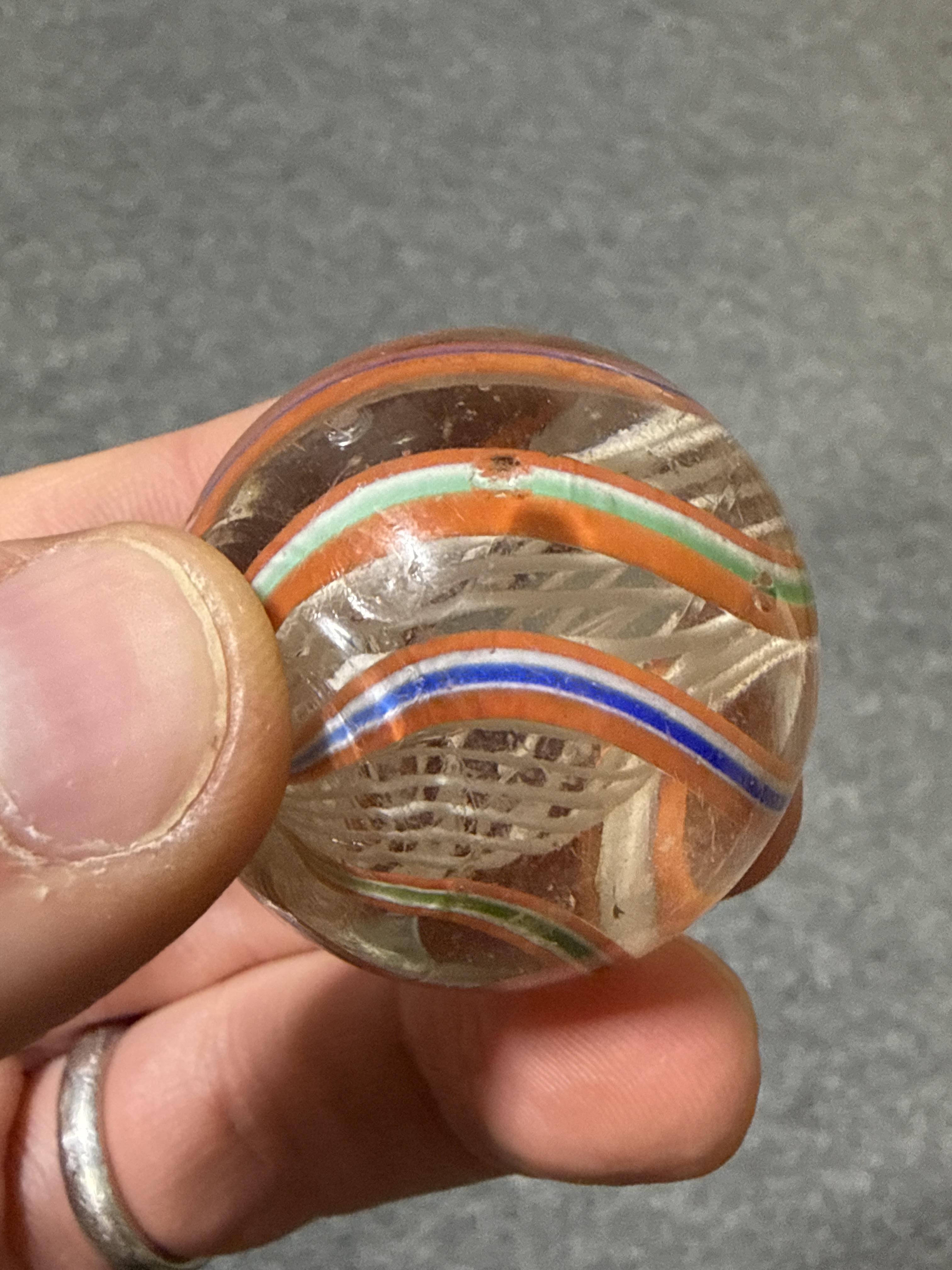 Lot 60 - Small collection of marbles, games, and a