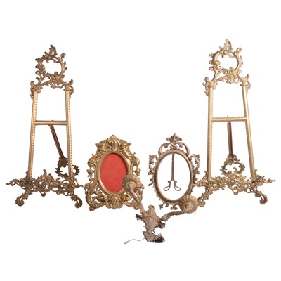 Lot 67 - Good pair of cast brass tabletop easels, picture frames, and a wall light