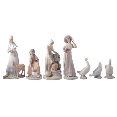 Lot 6 - Seven Nao models and another figurine