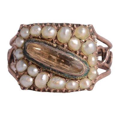 Lot 81 - A citrine and pearl ring.