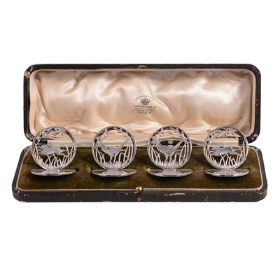 Lot 65 - Set of four silver menu stands