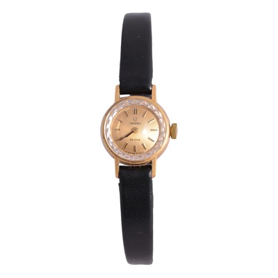 Lot 464 - Omega - a lady's vintage De Ville yellow metal manual wind wristwatch.