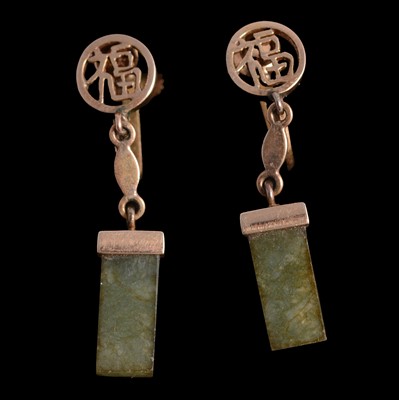Lot 178 - A pair of jade and yellow metal earscrews, marked 14K, and a gemset ring.