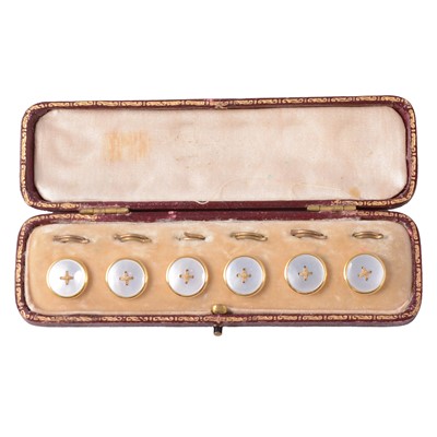 Lot 400 - A cased set of six mother-of-pearl dress studs.
