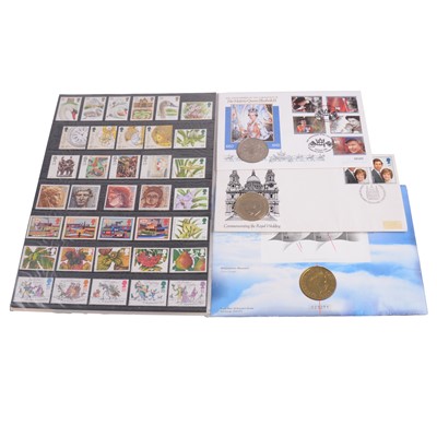 Lot 288 - Collection of coin covers, coins, and mint collection stamp packs.