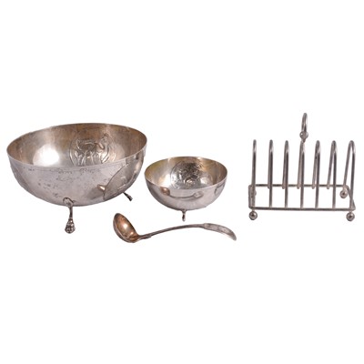 Lot 270 - Two white metal bowls, silver-plated ladle, and metal toast rack.