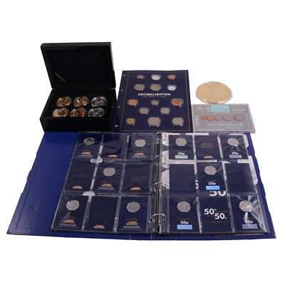 Lot 313 - Commemorative coins, coin sets, medallions, and replica collectors' cards.