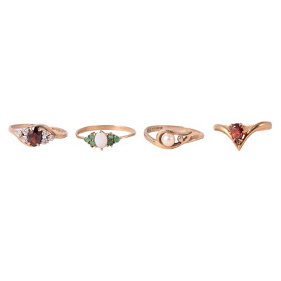 Lot 87 - Four gemset gold rings, opal and emerald, cultured pearl, garnet.