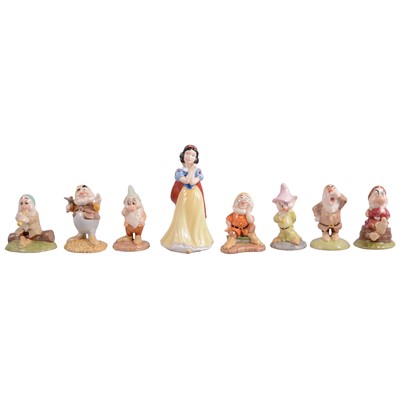 Lot 48 - Royal Doulton, Snow White and the Seven Dwarfs collectable figurines