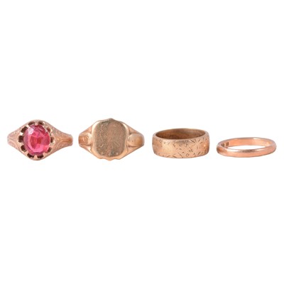 Lot 110 - A garnet topped doublet ring, and three 9 carat yellow gold rings.