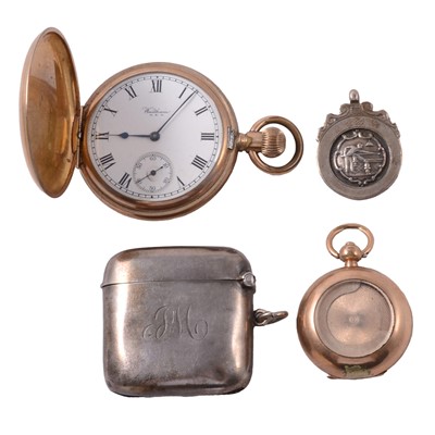 Lot 421 - A gold-plated full hunter pocket watch, gold-plated sovereign holder, silver medal, and vesta.