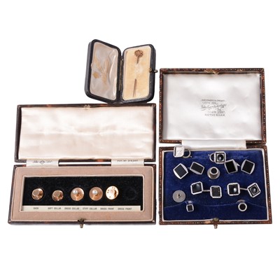 Lot 401 - A diamond stick pin, gold and onyx cufflinks, gold and other dress studs, and pin.