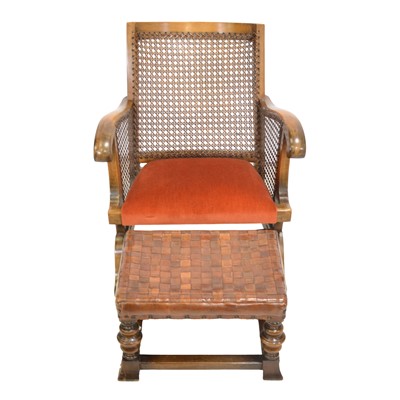 Lot 479 - Ercol nursing chair and an Ercol leather-strap tool