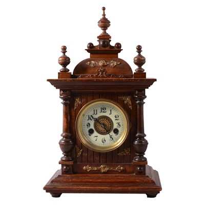 Lot 210 - German stained walnut and beechwood mantel clock